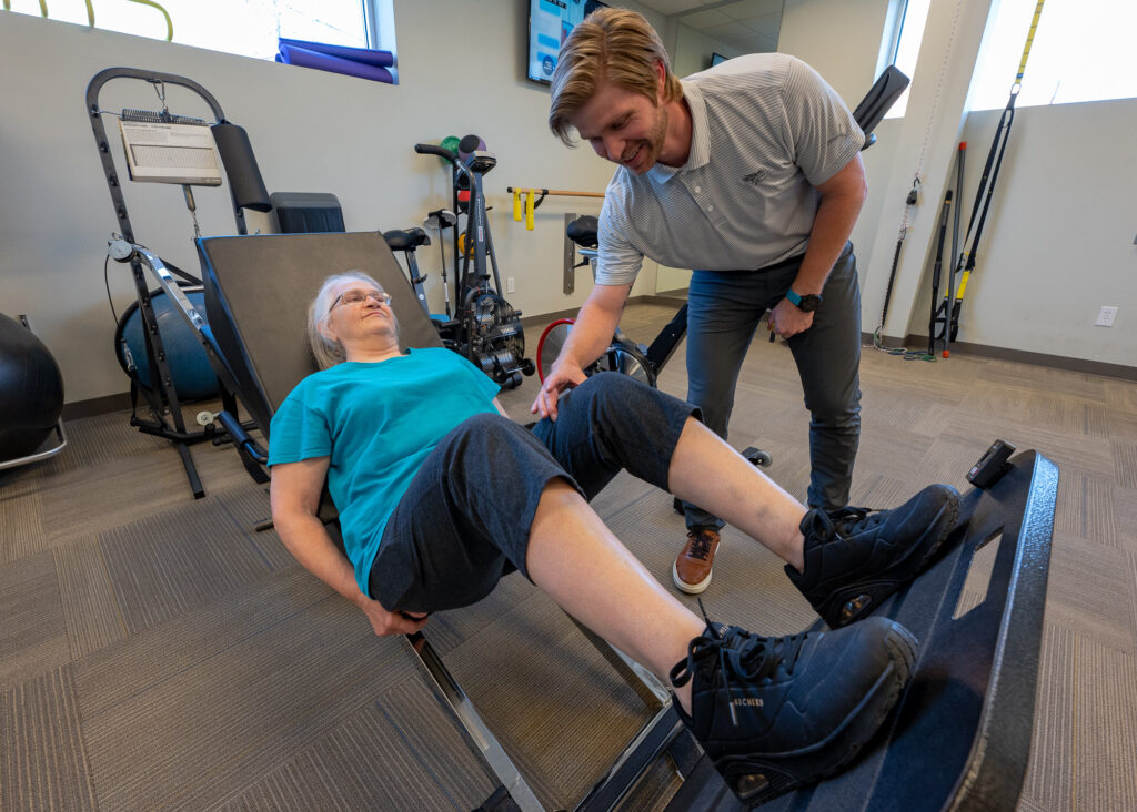 Garrett working with patient